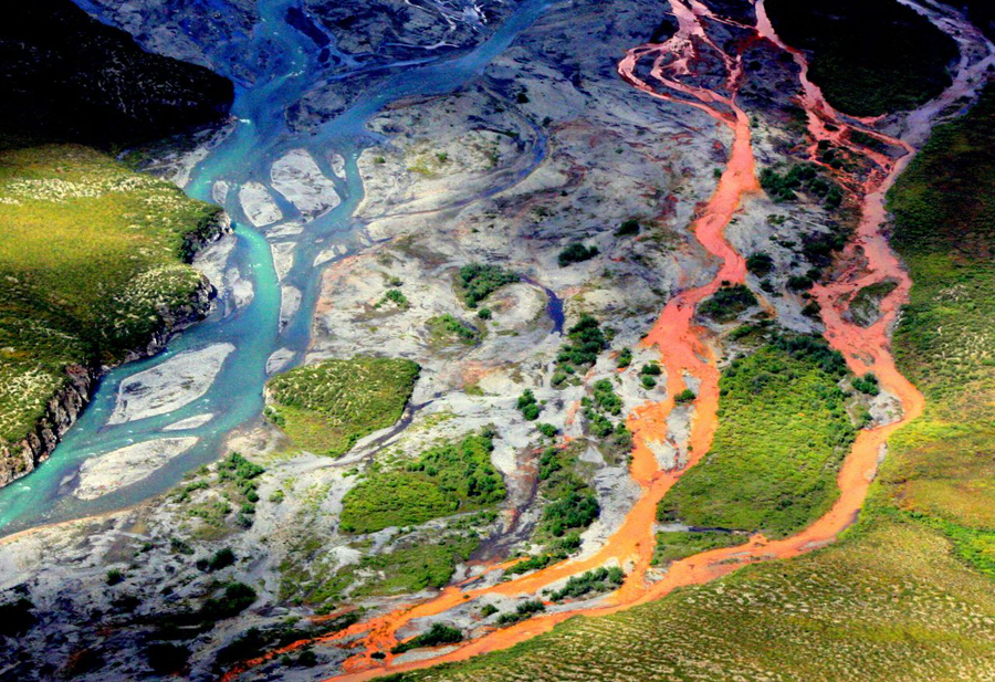 The Kutuk River in Alaska's Gates of the Arctic National Park flowing orange.